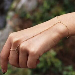 Ring & hand bracelet gold plated .